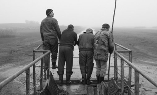 Three_man_and_a_fish_pond