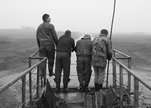 Three_man_and_a_fish_pond